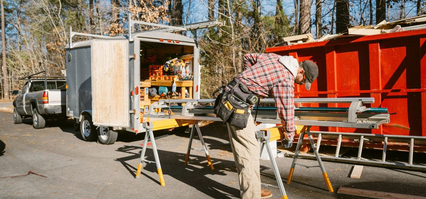 Estates Tree Service crew staging equipment at a job site